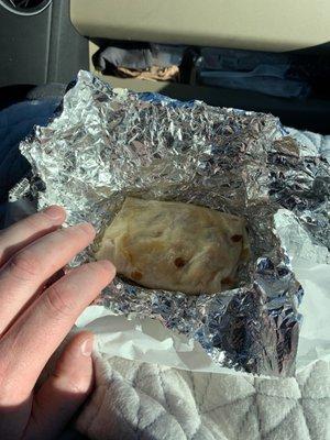 Bacon breakfast burrito. Pretty small