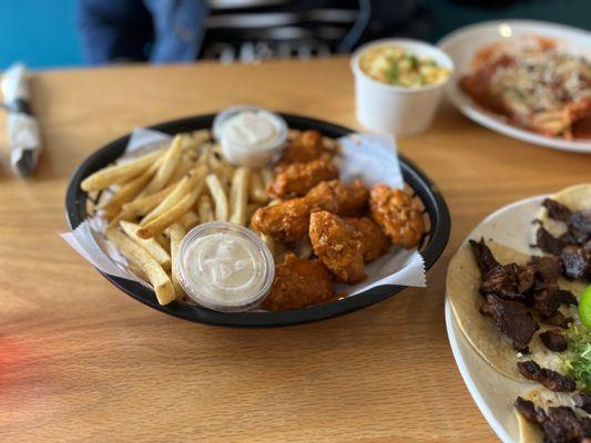 Boneless Buffalo wings with fries