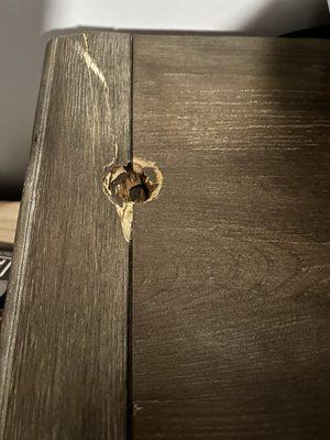 Hole through top of dresser