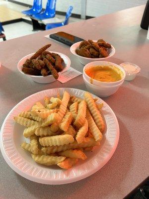 Fries, pickles and green beans. And the cheese for the fries on the side.