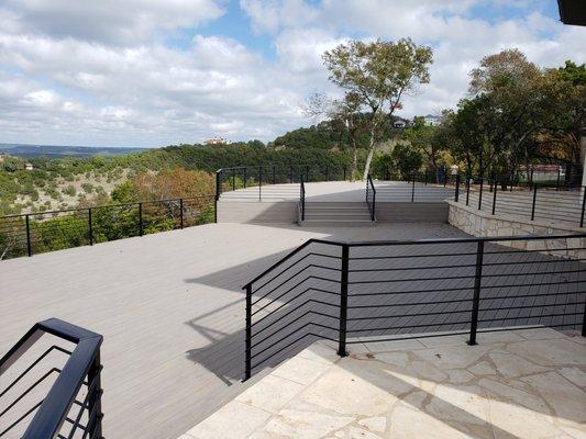 Handyman composite deck construction and metal railing Westlake Austin