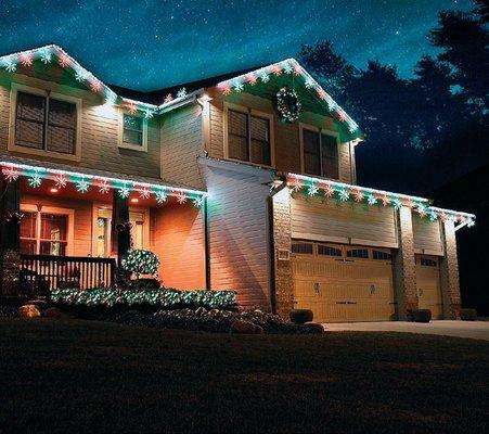 Residential home in Omaha, NE using our LED 3D Red and Green Starburst Artisticks.