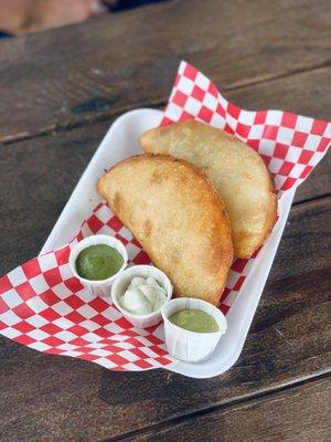 Empanadas (2 fillings-beef and cheese) with dips. Try all three. All of them are good!