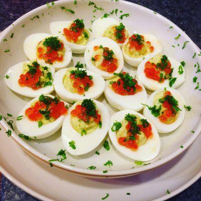 Eggs on eggs. Deviled eggs topped with caviar.