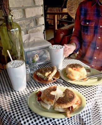 Mocha, day old Carmel roll, quiche, and bagel sandwich.