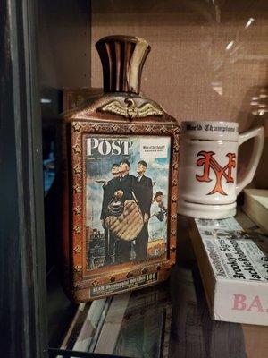 Baseball themed memorabilia in display cases in the Gotham Club