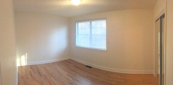 The master bedroom for a fully renovated townhome on Longwood Drive