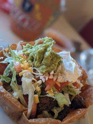 crispy taco salad bowl with beef fajita