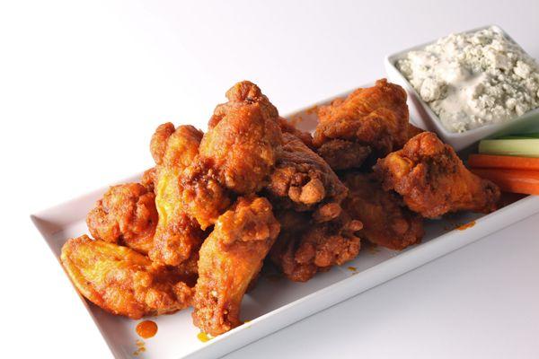 Crispy & tossed wings and blue cheese.