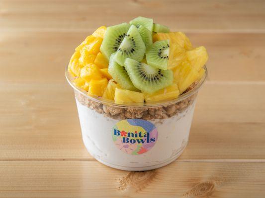 PILLOW TALK - COCONUT BASE TOPPED WITH GRANOLA, MANGO, KIWI, PINEAPPLE, & HONEY.