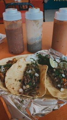 Two delicious fajita tacos and one of Pastor.