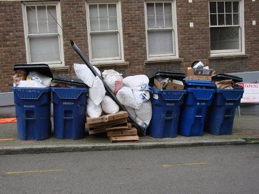 overflowing recycle bins