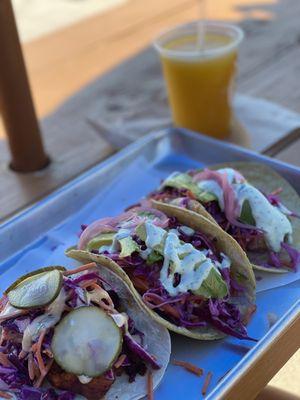 Nashville hot chicken taco (left) shrimp taco (middle and right)