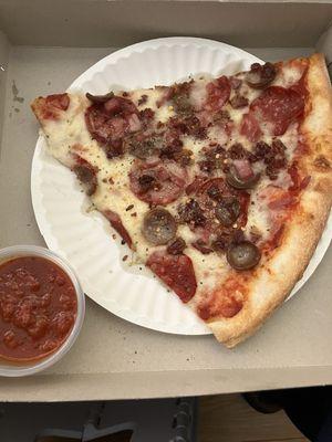 Meat lovers pizza with marinara sauce