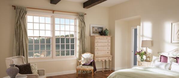 Bedroom with Milgard double hung windows, standard grids