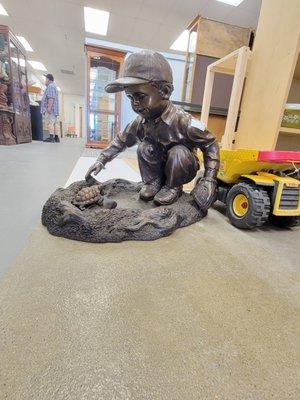 Boy playing Baseball Resin statue.