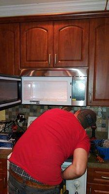 Sean hard at work on the microwave.