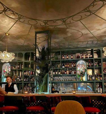 Obviously the bar underneath a wonderful trompe l'oeil mural