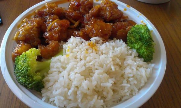 Orange chicken with steamed rice.