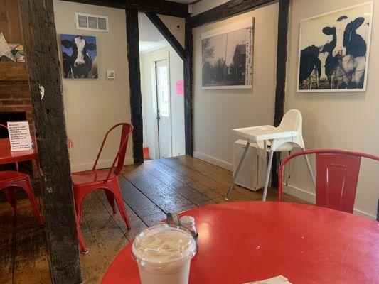 Iced chai latte on a cute back table