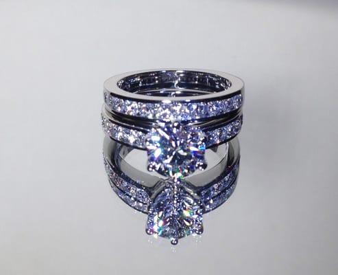 We can create custom-made diamond engagement rings and wedding band sets. Just ask!