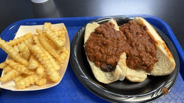 Spicy chili dogs (special - not on the daily menu) and crinkle cut fries.