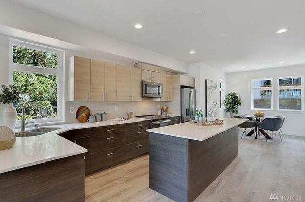 LVP flooring at Silver Lake condominium. Modern kitchen.