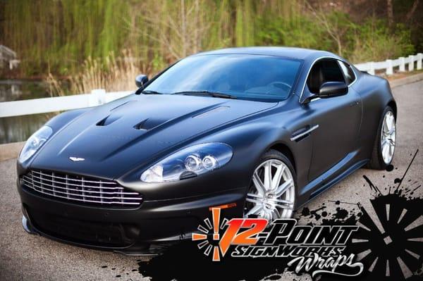 Aston Martin custom color change satin black car wrap.