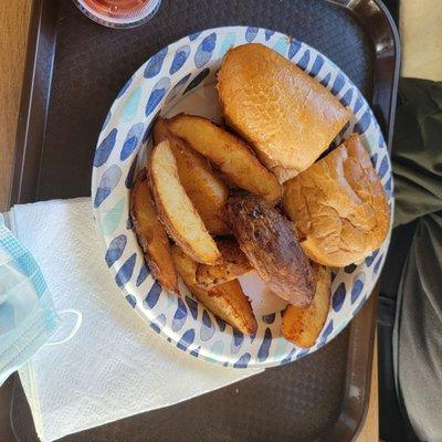 Tri Tip BBQ Sandwich on garlic buns with potato wedges. This meal was delicious and very filling.