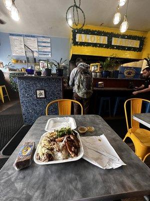 Dining area and mixed plate (bbq chicken and pig)