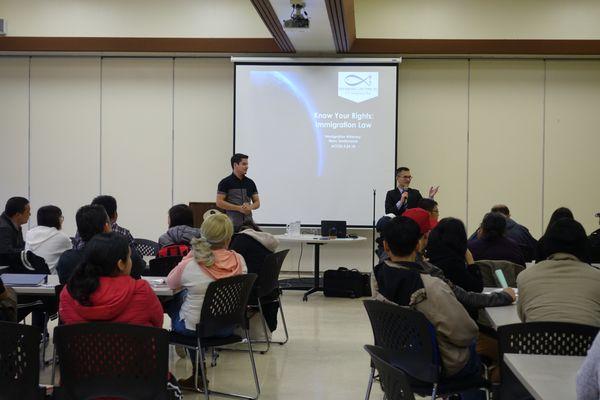 Attorney Santamaria and Legal Assistant Julio Lopez giving a know your rights presentation in different languages like Spanish and Chinese.