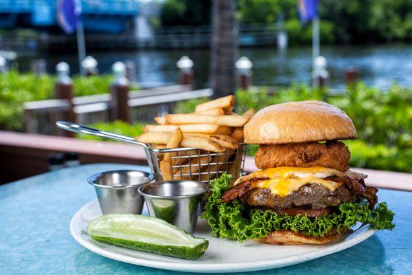 Prime Deck Burger | special blend burger, lettuce, vine ripe tomato, fried egg, applewood bacon, american cheese, crispy onion, asiago aioli