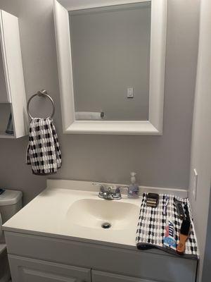 Bathroom- clean sink, tub, toilet