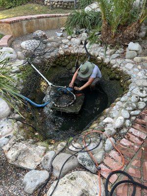 Working on restoring the pond.