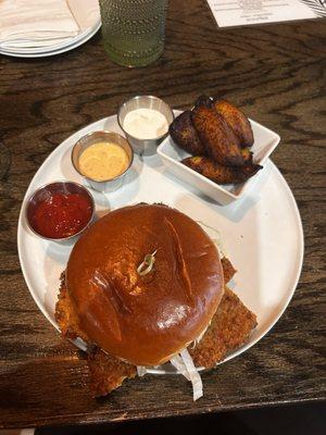 Chicken burger with side of maduros