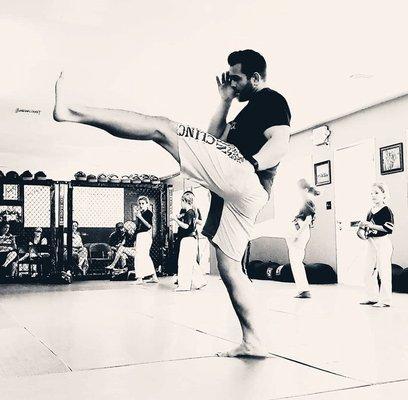 Mr. Leroy teaching the kids some amazing kickboxing and muay thai moves!