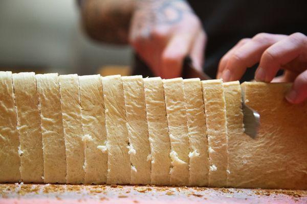 Slicing fresh shokupan (Japanese milk bread)