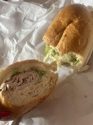 Turkey on a sub with cheddar, lettuce, onions, Mayo, s&p + vinegar. Soooo delish!