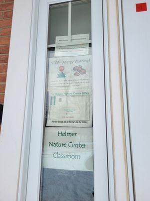 Signs on the Nature Center door