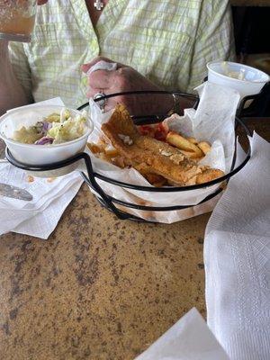 What's left of the walleye fish basket... that piece is going home for later! So good !m