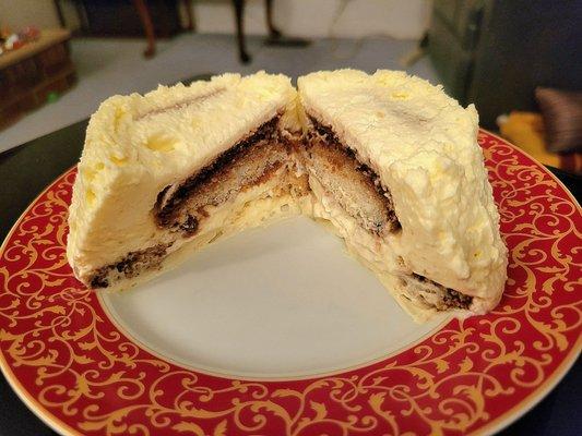 The tiramisu sliced open. No liqueur or cocoa powder.