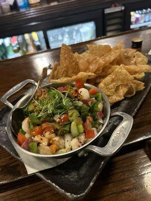 Shrimp & Scallop Ceviche served with fried wanton chips... excellent dish.