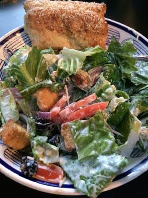 House salad with stuffed cheesy breadstick.