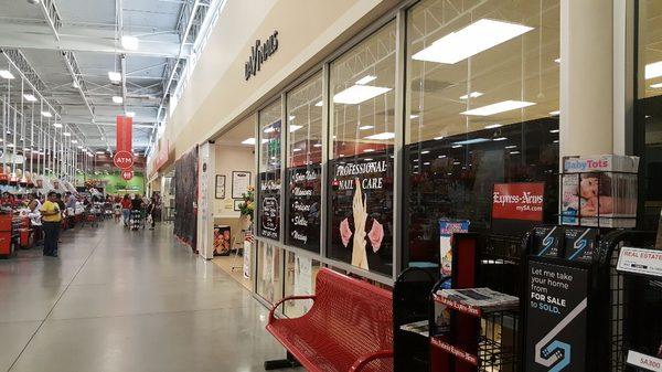 On the way in or out of HEB Plus. Free cold drink in summer!