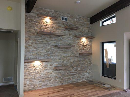 Stacked stone on a feature wall in any area can take a room from average to wow!