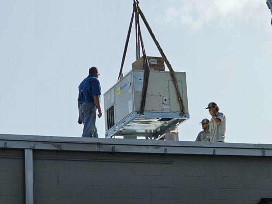 Flying in a new Daikin air conditioning unit.