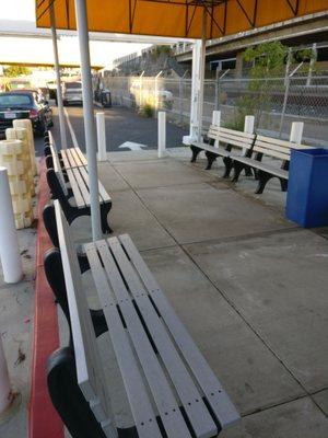 Seats outside of the car wash area...