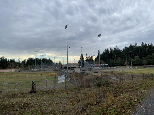 Baseball fields bordering the trail.