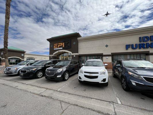 Epik cash car rental fleet and store sign