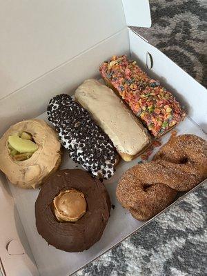 Donuts (top to the right): Caramel apple, choc chip, maple long John, fruity pebbles, chocolate peanut butter, cinnamon twist